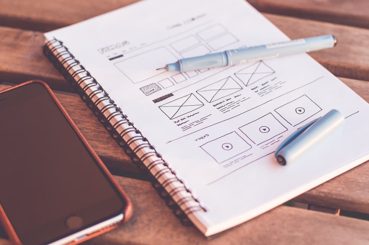 Liverpool Web Design - notepad showing web page design being drawn out